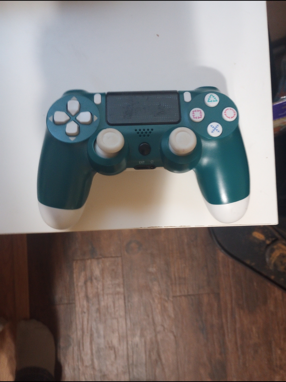 White Wireless Game Controller with Teal Accents
